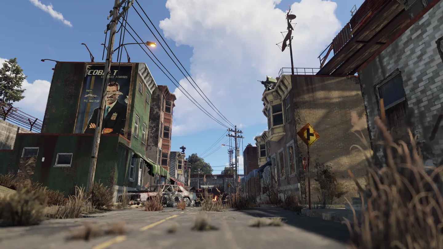 Улица Аутпоста в Rust: здания, провода и растительность
